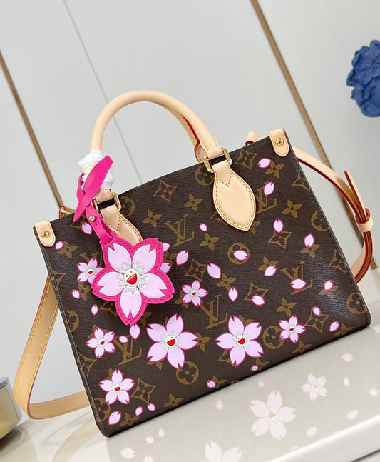 Louis Vuitton x TM Borsa OnTheGo PM