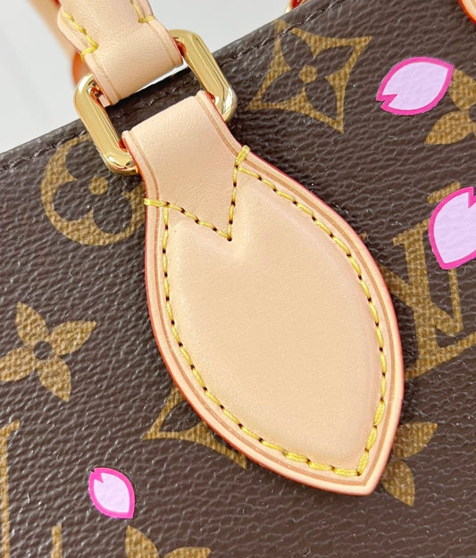 Louis Vuitton x TM Borsa OnTheGo PM